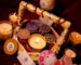 Luxury gift hamper by The Candle Ritual featuring a scented candle, mug, chocolates, greeting card, and premium gift packaging for special occasions.